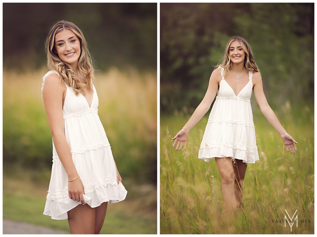High school senior girl in a field with a white sundress.