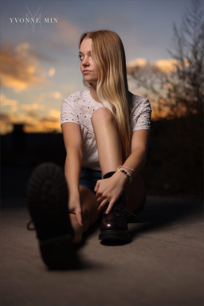An OCF senior photograph of a Mountain Range High School senior girl taken in the RiNo district of downtown Denver by Yvonne Min Photography.