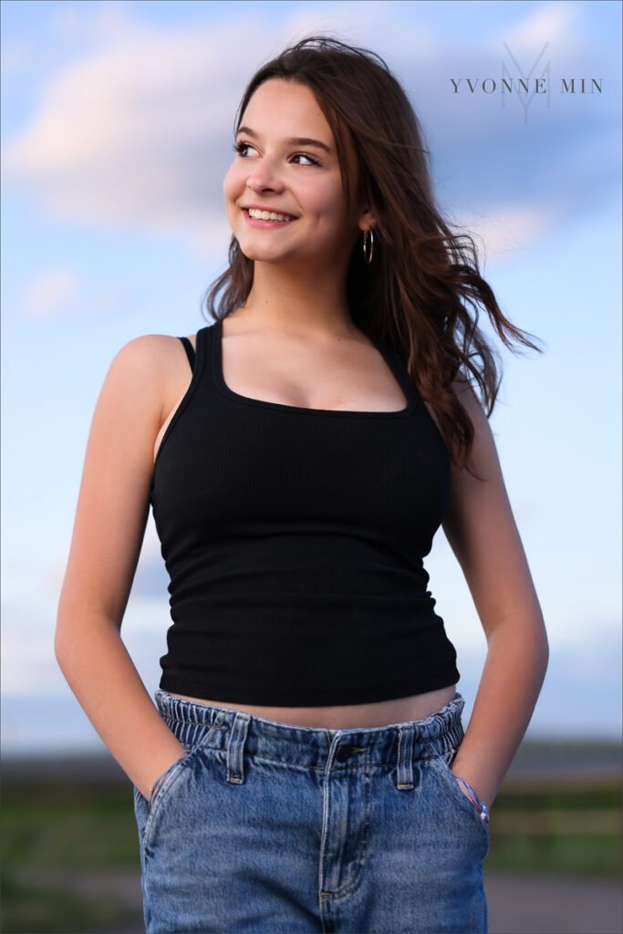 An OCF senior photo of a Stargate High School girl taken at Flatirons Vista outside Boulder, Colorado by Yvonne Min Photography.