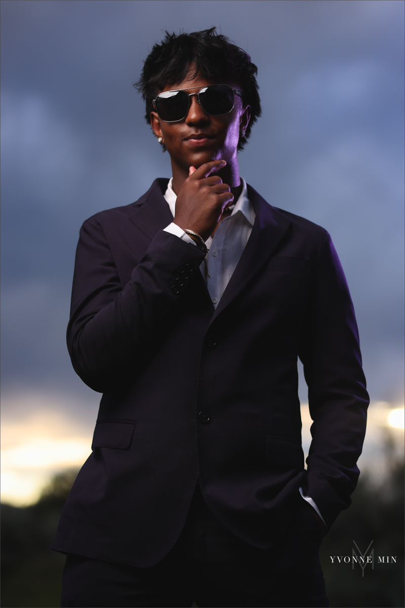 An OCF photograph of a high school senior boy from Stargate High School taken in Majestic Views Park, Arvada by Yvonne Min Photography.