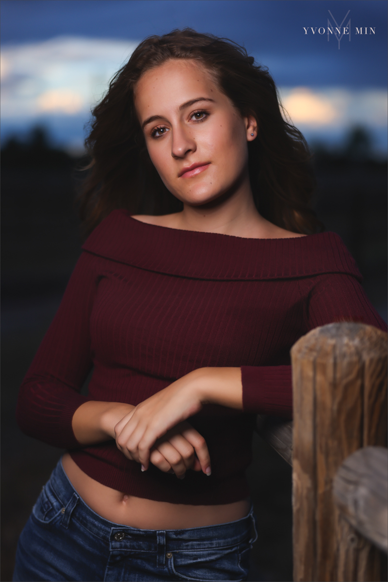 A senior photo taken with off-camera (OCF) flash on Davidson Mesa Trailhead of a Legacy High School student by Yvonne Min Photography.