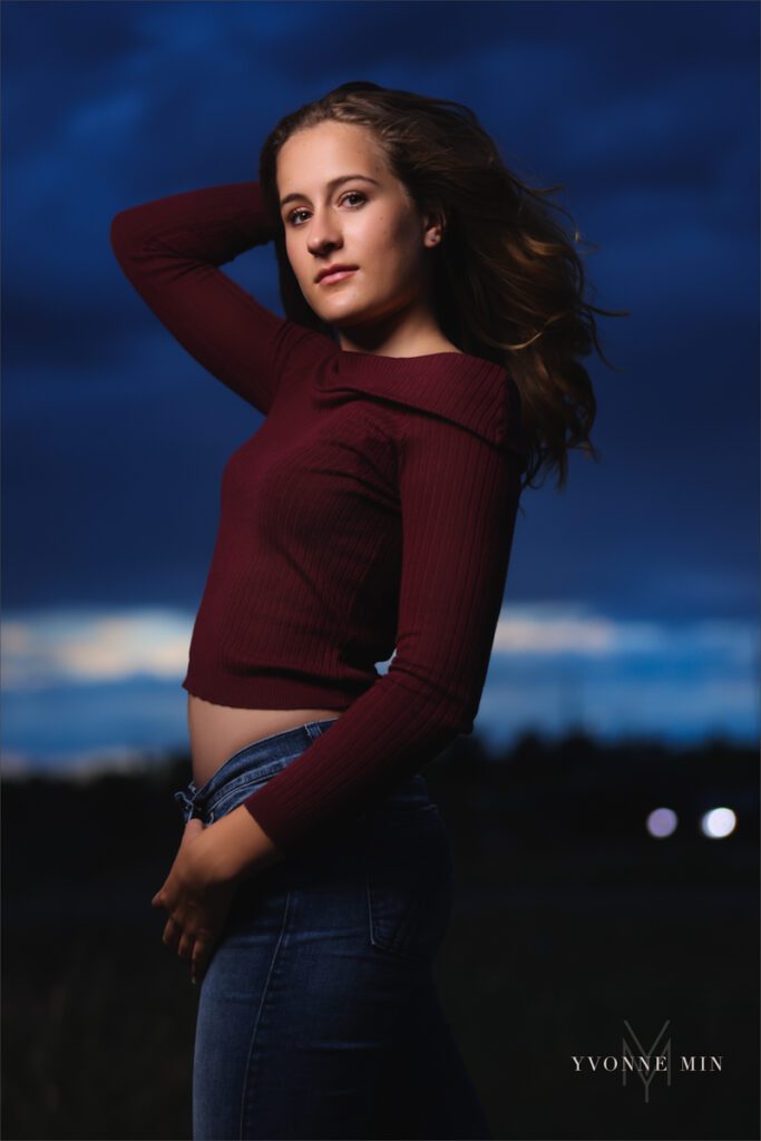 A senior photo taken with off-camera (OCF) flash on Davidson Mesa Trailhead of a Legacy High School student by Yvonne Min Photography.