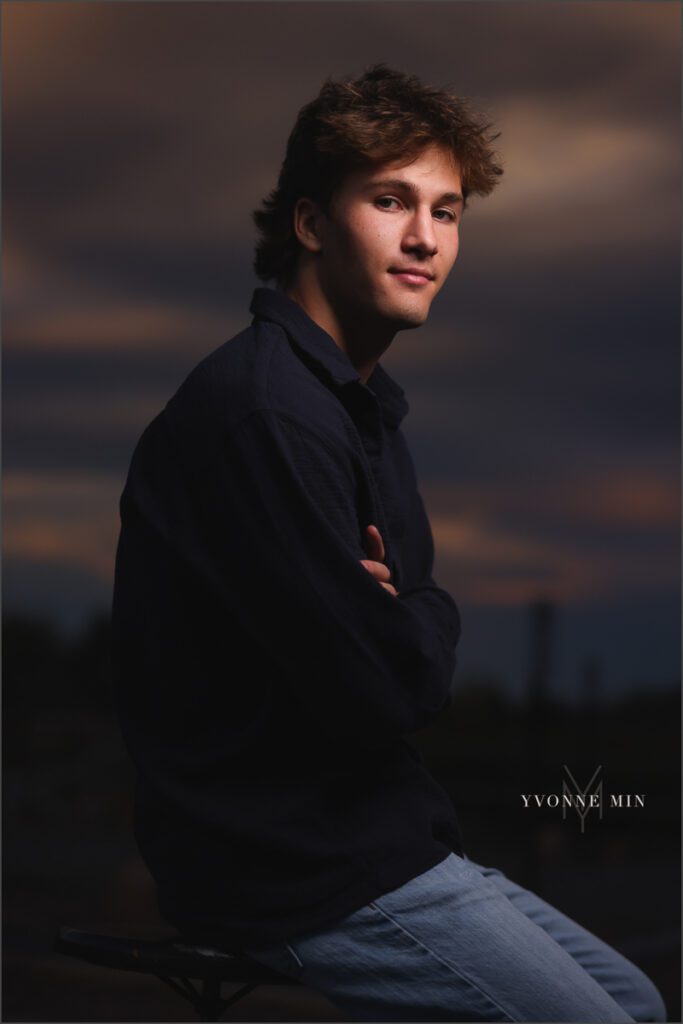 A senior picture shot with OCF of a high school student from Northfield High School taken by Yvonne Min Photography at South Mesa Trailhead outside Boulder Colorado.